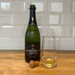 benjamin truffer non alcoholic sparkling Moscato with glass and cork
