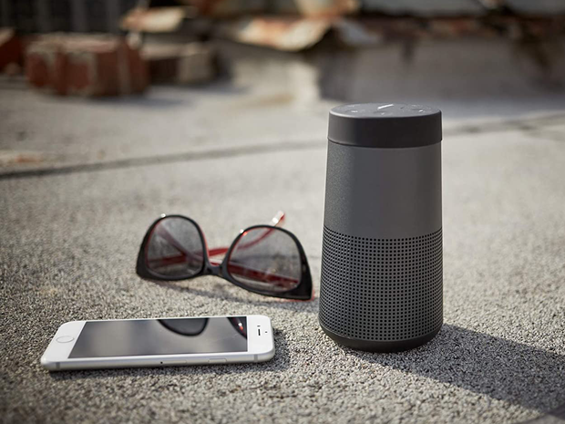 bose-soundlink-revolve-with-sunglasses-and-phone