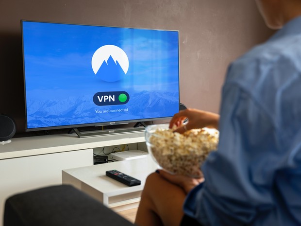 woman-watches-movie-nordvpn-with-popcorn