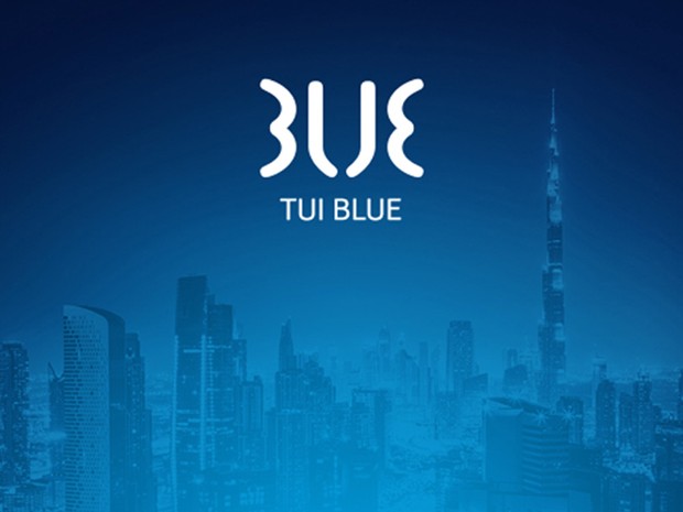 TUI Blue branding on blue background